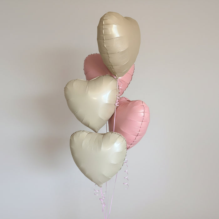 Cluster of heart balloons
